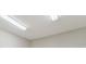 Bright ceiling with fluorescent lighting in a neutral-toned room at 10825 Charmwood Dr, Riverview, FL 33569