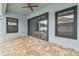 Outdoor lanai with stylish brick pavers, dark trim and access to the patio and pool area at 10825 Charmwood Dr, Riverview, FL 33569