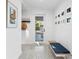 Modern entryway with ample art and seating at 5027 Sunrise S Dr, St Petersburg, FL 33705