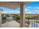 This balcony offers stunning views of the nearby golf course and features a table and chairs at 6051 Sun Blvd # 504, St Petersburg, FL 33715