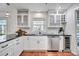 Modern kitchen with granite countertops, stainless steel appliances, and ample cabinet space at 11624 Monette Rd, Riverview, FL 33569