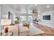 Open concept living room with decorative tile floors and access to an outdoor patio at 11624 Monette Rd, Riverview, FL 33569