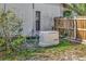 Image showing a generator that is outside the home near some greenery at 1803 Tawnee Pl, Brandon, FL 33510