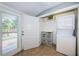 Bright laundry room features a washer/dryer, storage, and access to the outdoor area, perfect for easy living at 2715 14Th N Ave, St Petersburg, FL 33713