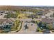 Aerial view of the community entrance, amenities, and lush surroundings at 29913 Southwell Ln, Wesley Chapel, FL 33543
