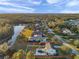 Aerial view of home with pool, fenced yard and a scenic lake in the background. Property line overlaid at 3870 155Th E Ave, Parrish, FL 34219