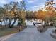 A boat launch and wooden dock on a calm river under a clear blue sky at 3870 155Th E Ave, Parrish, FL 34219
