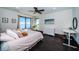 Inviting bedroom featuring hardwood floors, waterfront views, and neutral decor at 3901 Bayshore Ne Blvd, St Petersburg, FL 33703