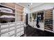 Spacious walk-in closet with custom shelving, drawers, and hanging space, perfect for organization at 3901 Bayshore Ne Blvd, St Petersburg, FL 33703