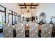 Expansive dining room with high ceilings, fireplace, and ornate chandelier at 3901 Bayshore Ne Blvd, St Petersburg, FL 33703