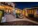 Grand front entrance with iron doors and intricate stonework accents, creating a welcoming facade at 3901 Bayshore Ne Blvd, St Petersburg, FL 33703