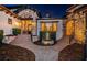 Elegant front entrance with stone accents, mature landscaping, and a charming fountain at 3901 Bayshore Ne Blvd, St Petersburg, FL 33703
