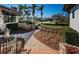Inviting walkway with stone accents and lush landscaping leading to an elegant home at 3901 Bayshore Ne Blvd, St Petersburg, FL 33703