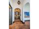 Hallway view of the wine grotto with decorative gate and stone flooring at 3901 Bayshore Ne Blvd, St Petersburg, FL 33703