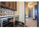 Hallway featuring wine storage and access to the ensuite bathroom at 3901 Bayshore Ne Blvd, St Petersburg, FL 33703