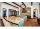 Open kitchen with custom vent hood, tile backsplash, and ample counter space at 3901 Bayshore Ne Blvd, St Petersburg, FL 33703