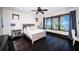 Charming bedroom with scenic lake views from the dark-trimmed windows at 3901 Bayshore Ne Blvd, St Petersburg, FL 33703