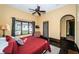 Spacious main bedroom featuring large windows and dark wood floors at 3901 Bayshore Ne Blvd, St Petersburg, FL 33703