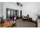 Office featuring dual workstations, rustic wood furnishings, ceiling fan and French doors with water view at 3901 Bayshore Ne Blvd, St Petersburg, FL 33703