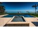 A backyard featuring a pool, spa, and views of the bay at 3901 Bayshore Ne Blvd, St Petersburg, FL 33703