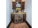 This wine grotto has custom cabinetry, granite counters, custom lighting and wine refrigerator at 3901 Bayshore Ne Blvd, St Petersburg, FL 33703