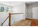 Upstairs landing area with natural light, staircase, and decorative accents at 4224 W Kensington Ave, Tampa, FL 33629
