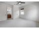 Bright bedroom with ensuite bathroom access and double door closet at 5020 W Dickens Ave, Tampa, FL 33629