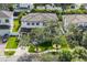 Lovely home with mature landscaping and well-manicured lawn at 5020 W Dickens Ave, Tampa, FL 33629