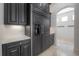 Elegant refrigerator with built-in water dispenser nestled in custom cabinetry at 5020 W Dickens Ave, Tampa, FL 33629