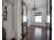 Elegant living room featuring a fireplace, dark wood floors, and ample natural light at 5020 W Dickens Ave, Tampa, FL 33629