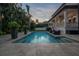 Backyard with a pool and spacious patio for entertaining at 5020 W Dickens Ave, Tampa, FL 33629