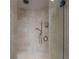 Luxurious shower with multiple shower heads and upscale tile at 5020 W Dickens Ave, Tampa, FL 33629