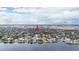 Tampa Bay area home with canal access, lush landscaping, and easy access to the bay at 513 Suwanee Cir, Tampa, FL 33606