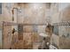 Modern bathroom shower featuring neutral tile work and decorative accents at 513 Suwanee Cir, Tampa, FL 33606