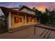 Exterior view of the home featuring a spacious covered patio and a deck with a hot tub at 513 Suwanee Cir, Tampa, FL 33606
