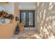 Beautiful front entrance featuring double doors with decorative glass, and a tiled porch with decor at 513 Suwanee Cir, Tampa, FL 33606
