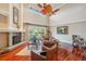 Spacious living room with fireplace, soaring ceilings and views to the waterfront at 513 Suwanee Cir, Tampa, FL 33606
