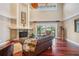 Spacious living room with fireplace, soaring ceilings and views to the waterfront at 513 Suwanee Cir, Tampa, FL 33606