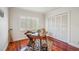 Bright office space with wood floors, plantation shutters, and custom closet at 513 Suwanee Cir, Tampa, FL 33606