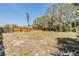 Spacious backyard with partial fencing and a mix of open area, ready for landscaping at 5130 Dr Martin Luther King Jr St S, St Petersburg, FL 33705