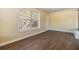 Well-lit bedroom highlighting modern flooring and a bright, airy feel at 5130 Dr Martin Luther King Jr St S, St Petersburg, FL 33705