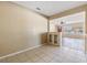 Open dining area next to the living room, featuring classic tile floors at 5130 Dr Martin Luther King Jr St S, St Petersburg, FL 33705