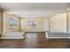 Bright living room displaying new floors and a spacious layout with natural light at 5130 Dr Martin Luther King Jr St S, St Petersburg, FL 33705