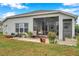 A backyard patio and landscaped lawn complement this inviting home at 5720 107Th E Ter, Parrish, FL 34219