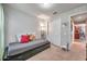 Comfortable bedroom featuring a daybed with storage drawers and a closet near the hallway at 5720 107Th E Ter, Parrish, FL 34219
