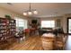 Inviting community room with a fireplace, comfortable seating, and entertainment options for residents at 5720 107Th E Ter, Parrish, FL 34219