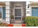 Inviting screened-in front porch showcasing the home's address and adding a touch of Southern charm at 5720 107Th E Ter, Parrish, FL 34219
