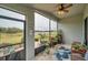 Relaxing screened lanai is perfect for enjoying the outdoors with a view of the pond at 5720 107Th E Ter, Parrish, FL 34219