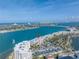 Aerial shot of waterfront condos with palm trees and a red arrow showing the home's location at 6093 Bahia Del Mar Cir # 375, St Petersburg, FL 33715