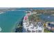 Aerial shot of waterfront condos with palm trees and a red arrow showing the home's location at 6093 Bahia Del Mar Cir # 375, St Petersburg, FL 33715